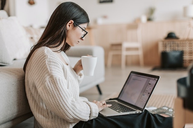 a-girl-is-working-on-laptop