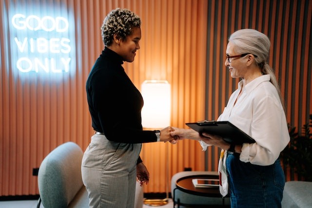 two-women-are-handshaking