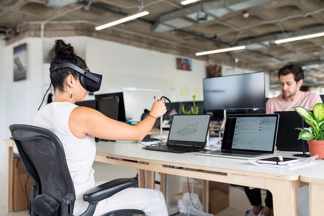 a-girl-is-working-with-the-help-of-VR-headset