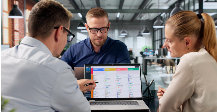 A-project-manager-reviewing-the-website-delivery-workflow-to-identify-bottlenecks